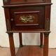 Empire style mahogany bedside table