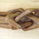 Carved African Hardwood Occasional Table with Geometric Top and Interlocking Legs