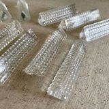12 portes couteaux en verre.