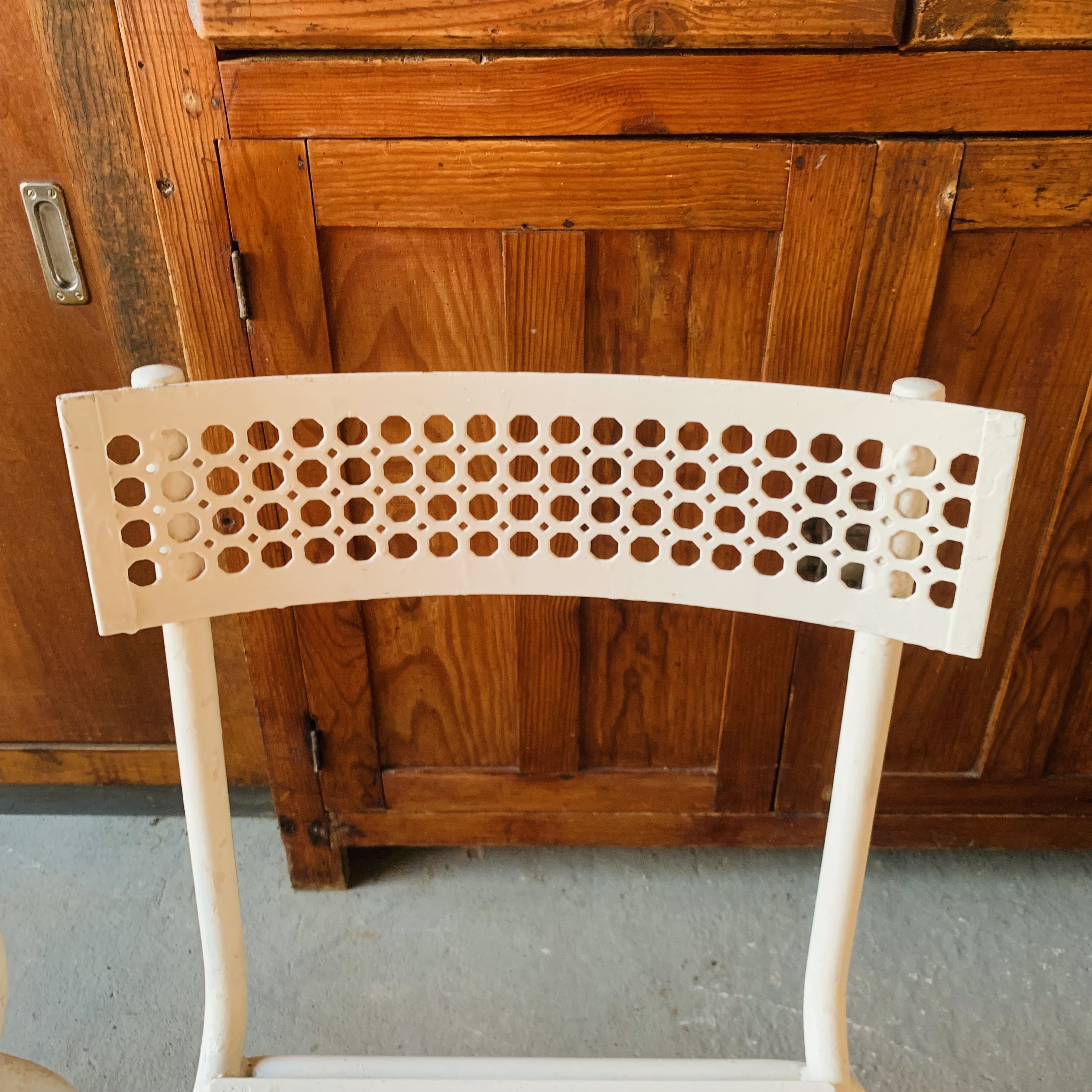Series of 3 perforated metal chairs