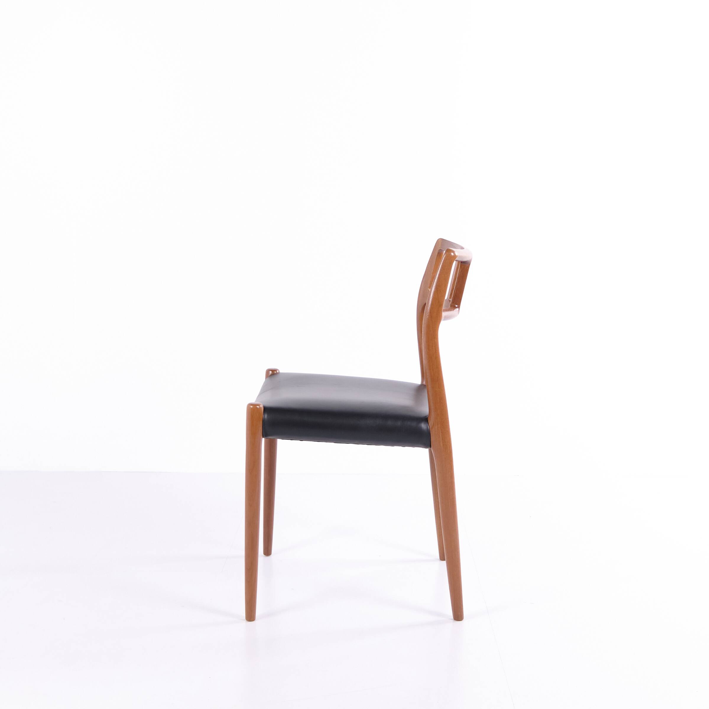 Dining chair – Niels Otto Møller – Model 79 – Teak & black leather – JL Møllers Møbelfabrik – 1960s