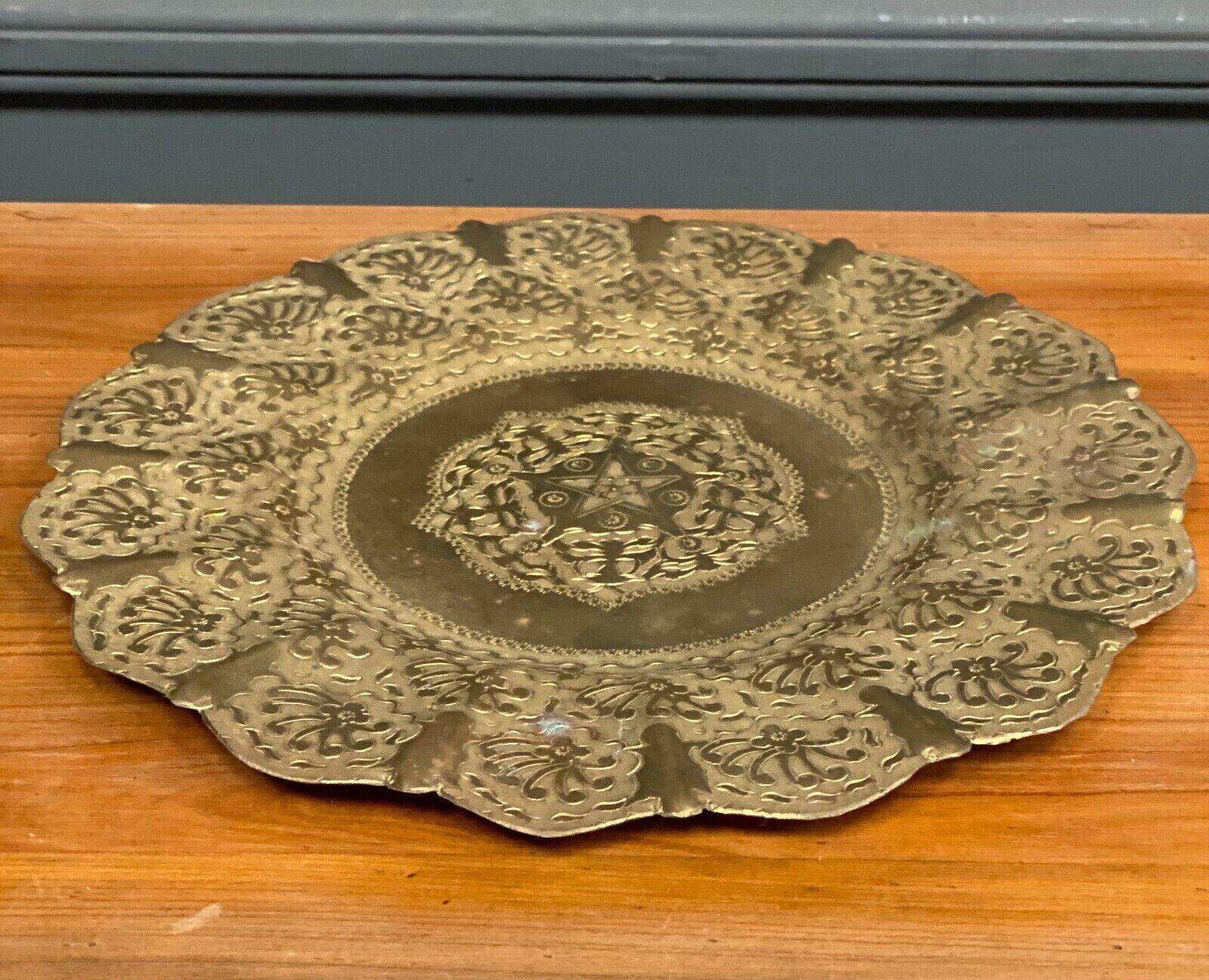 Oriental tea tray in copper or brass richly decorated 20th century