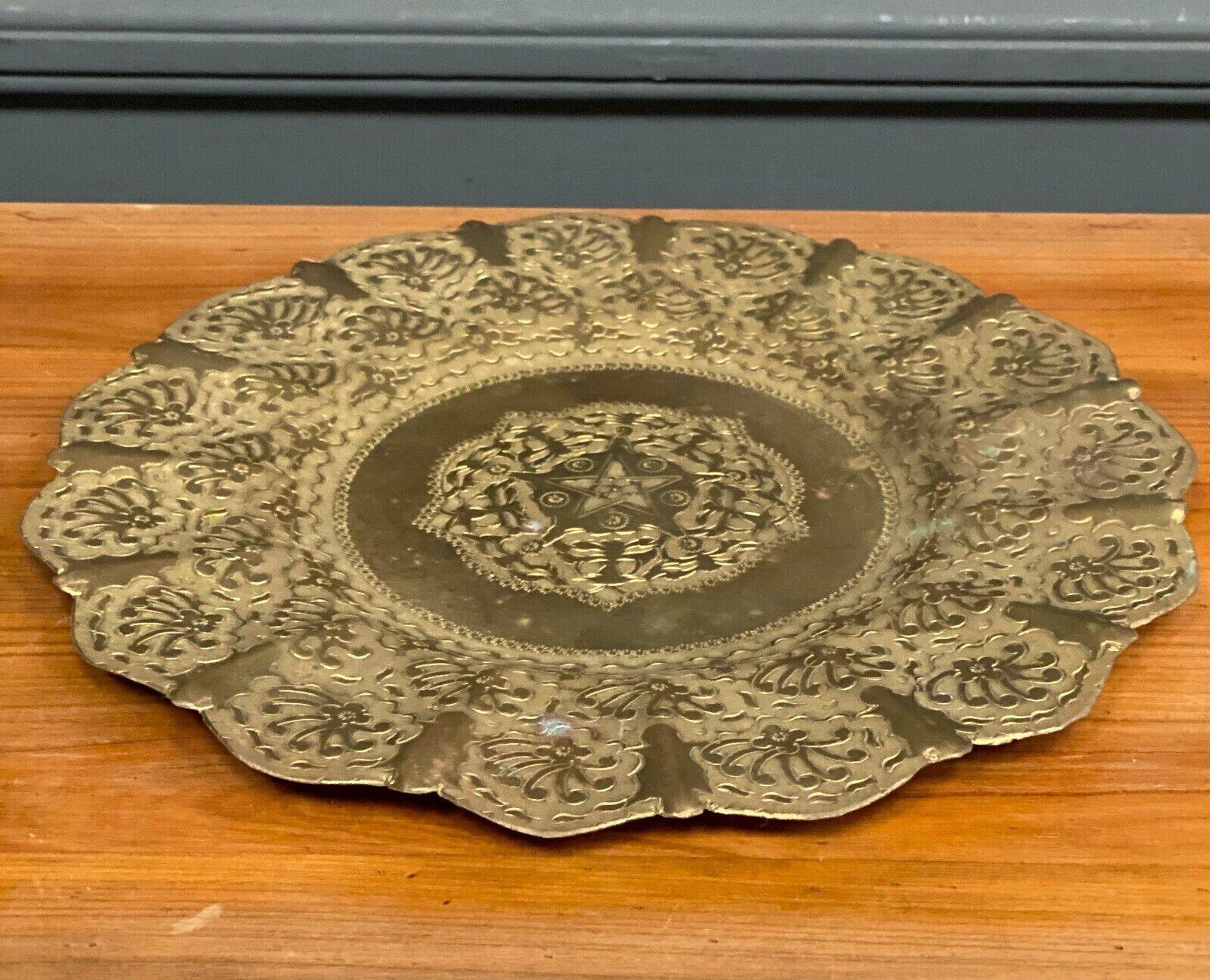 Oriental tea tray in copper or brass richly decorated 20th century