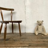Brutalist primitive style wooden chair
