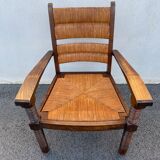 Vintage armchair in straw and brutalist wood