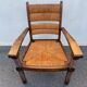 Vintage armchair in straw and brutalist wood