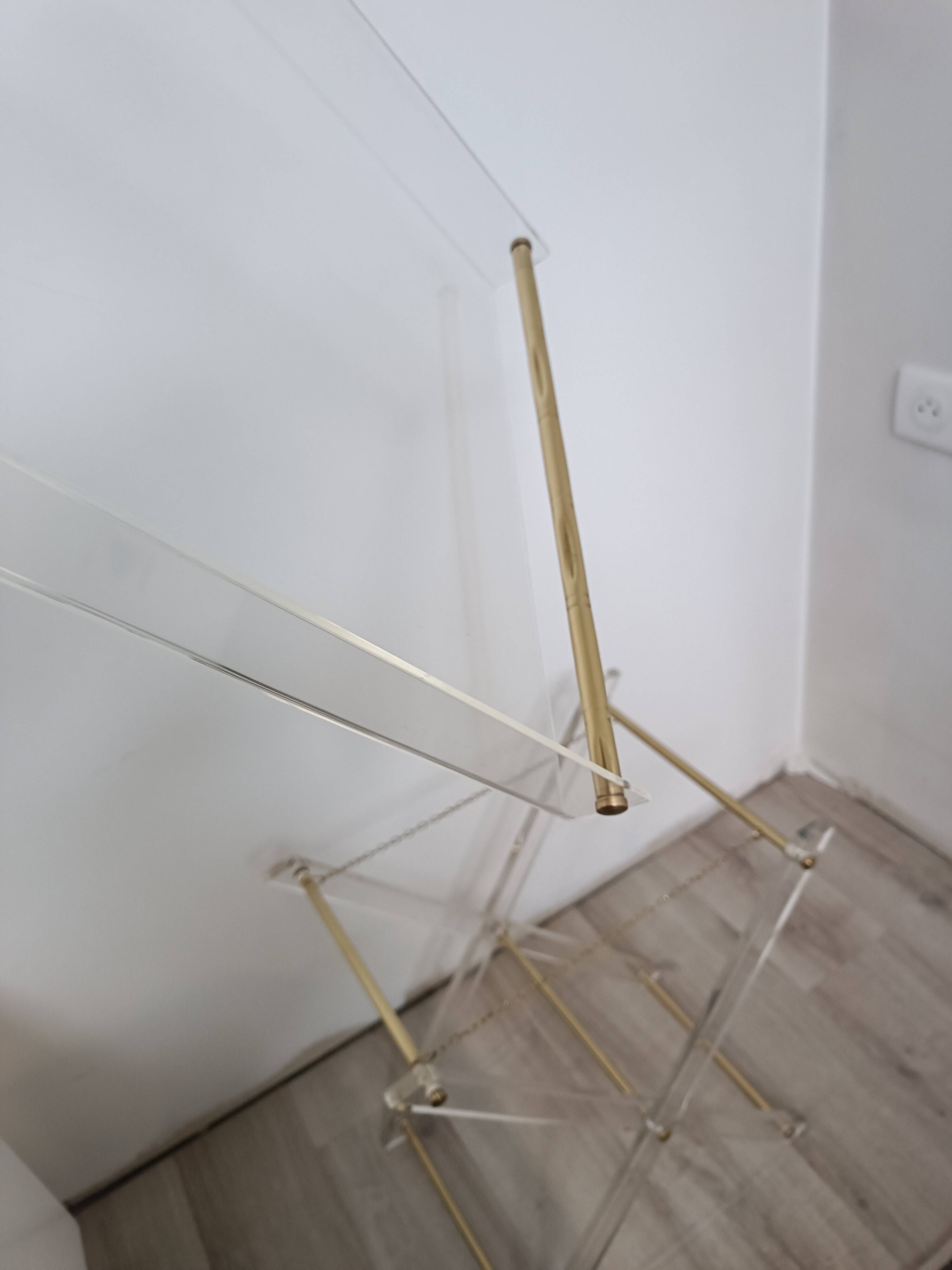 Folding side table in plexiglass and brass, 1970s.