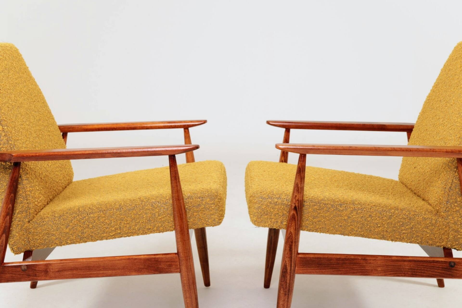 Pair of vintage boucle mustard armchairs H.Lis