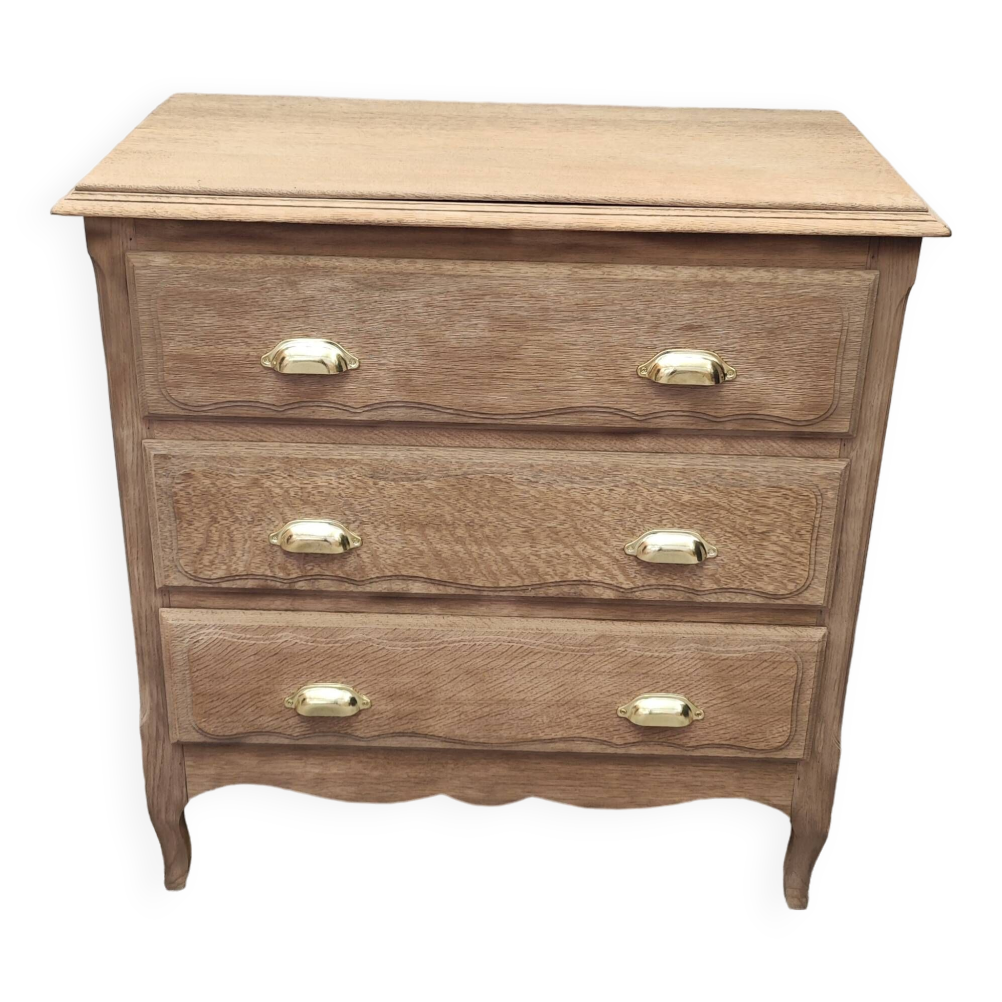 Old three-drawer chest of drawers in raw oak