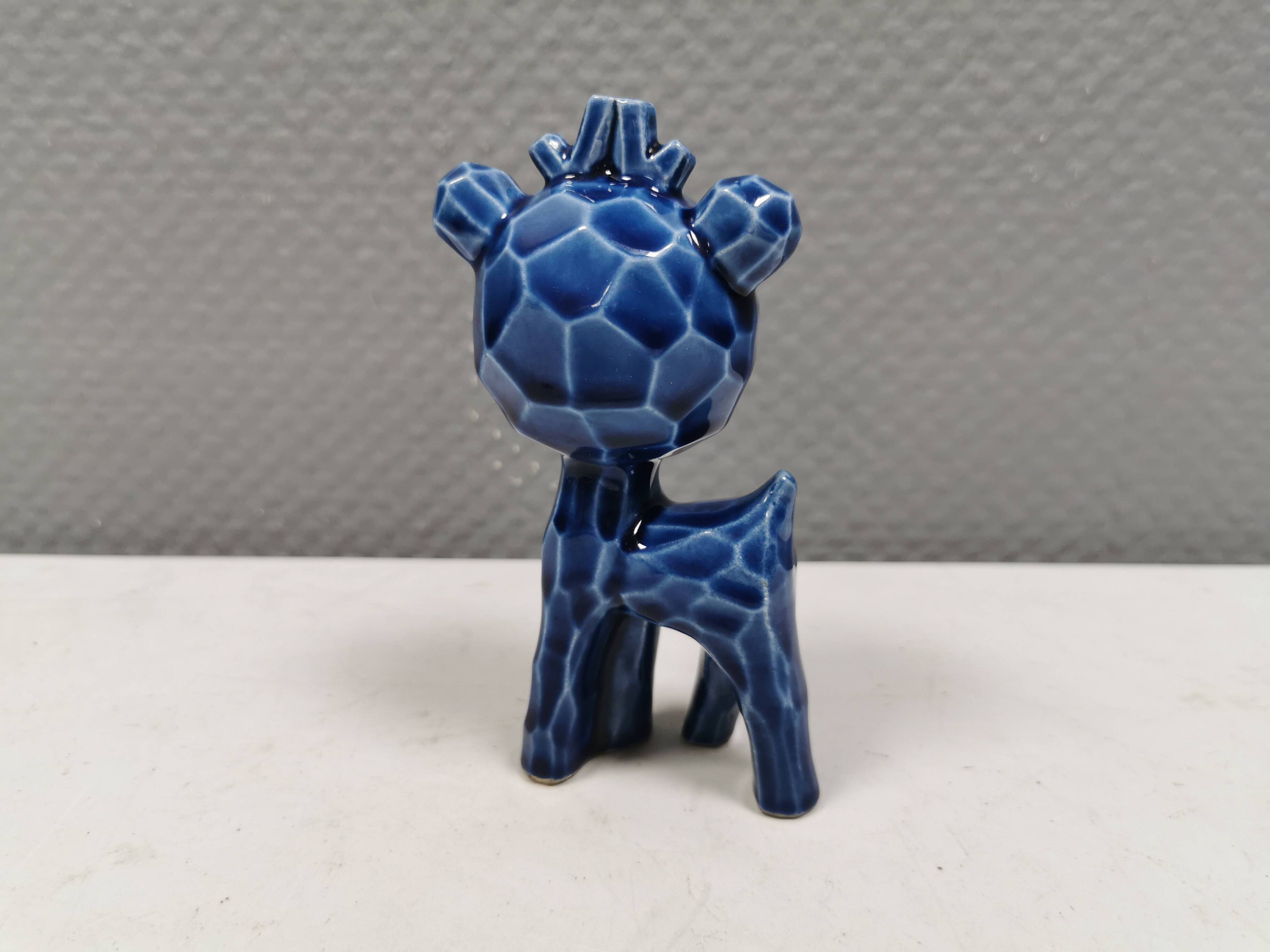 A Japanese ceramic “toy” from the 70s, blue Kawaii animal deer figurine.