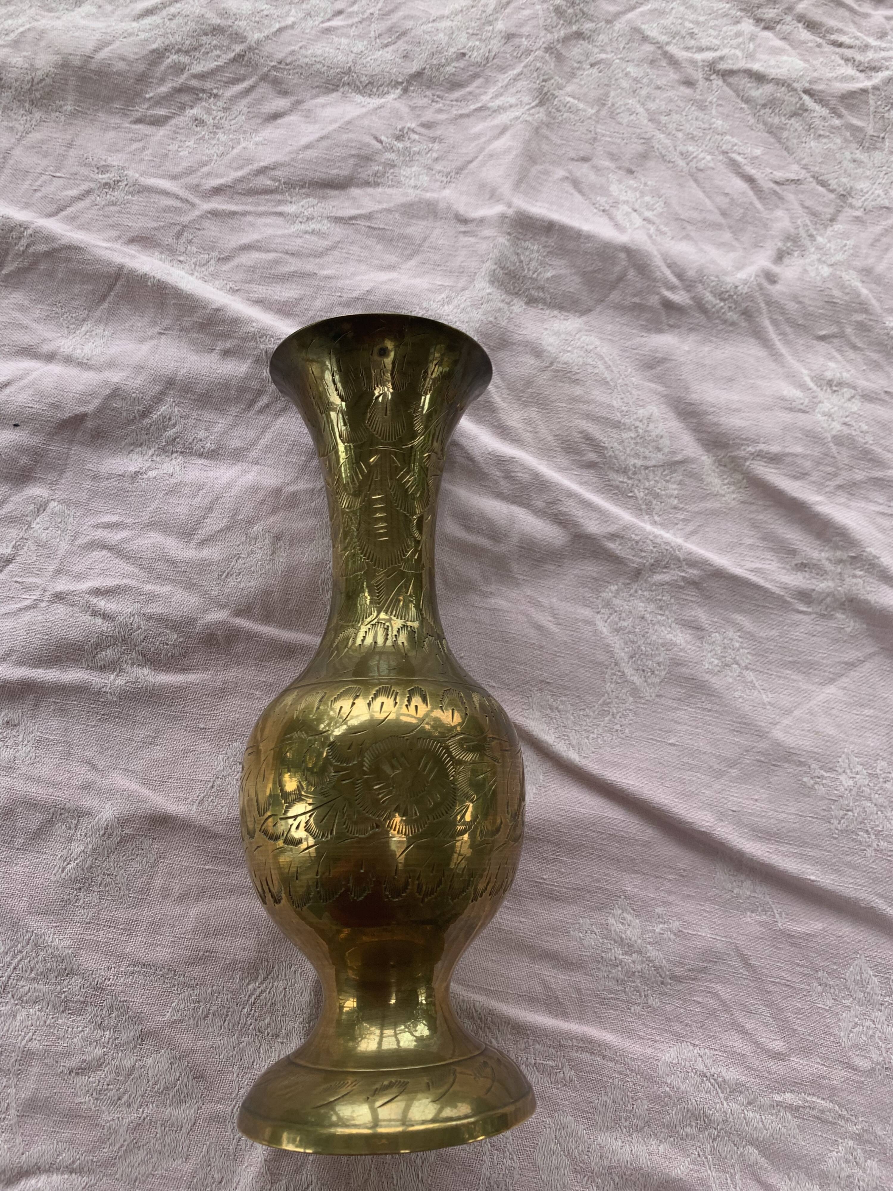 Golden brass vase chiseled vintage floral pattern