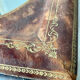 Antique leather framed mirror with gildings 30 cm x  24 cm