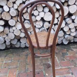 Curved wooden bistro chair and canning