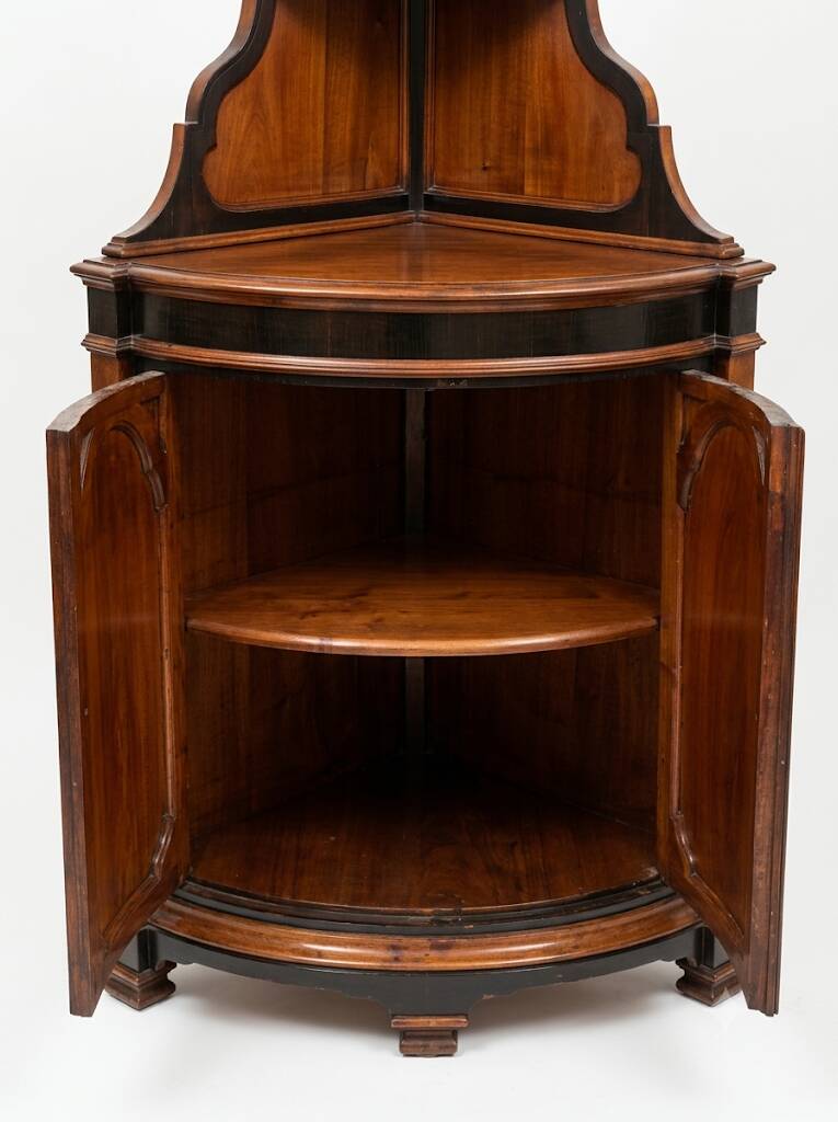 Lombard corner cabinet in ebony wood, late 19th century.