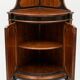 Lombard corner cabinet in ebony wood, late 19th century.