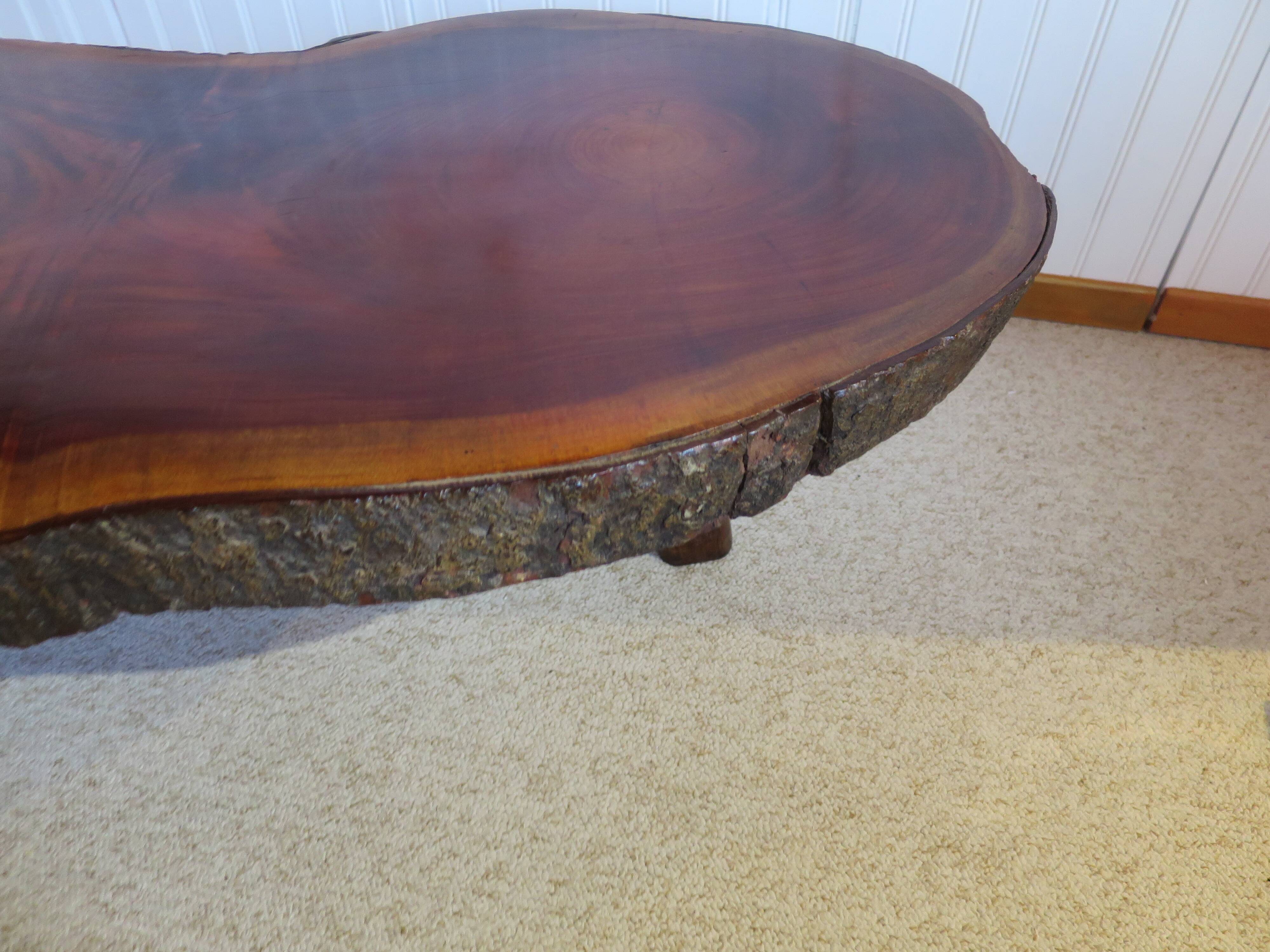 Tripod coffee table - solid okoumé wood - organic shape - brutalist style