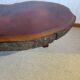 Tripod coffee table - solid okoumé wood - organic shape - brutalist style