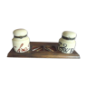 Antique ceramic inkwells on wood support with 4 feathers