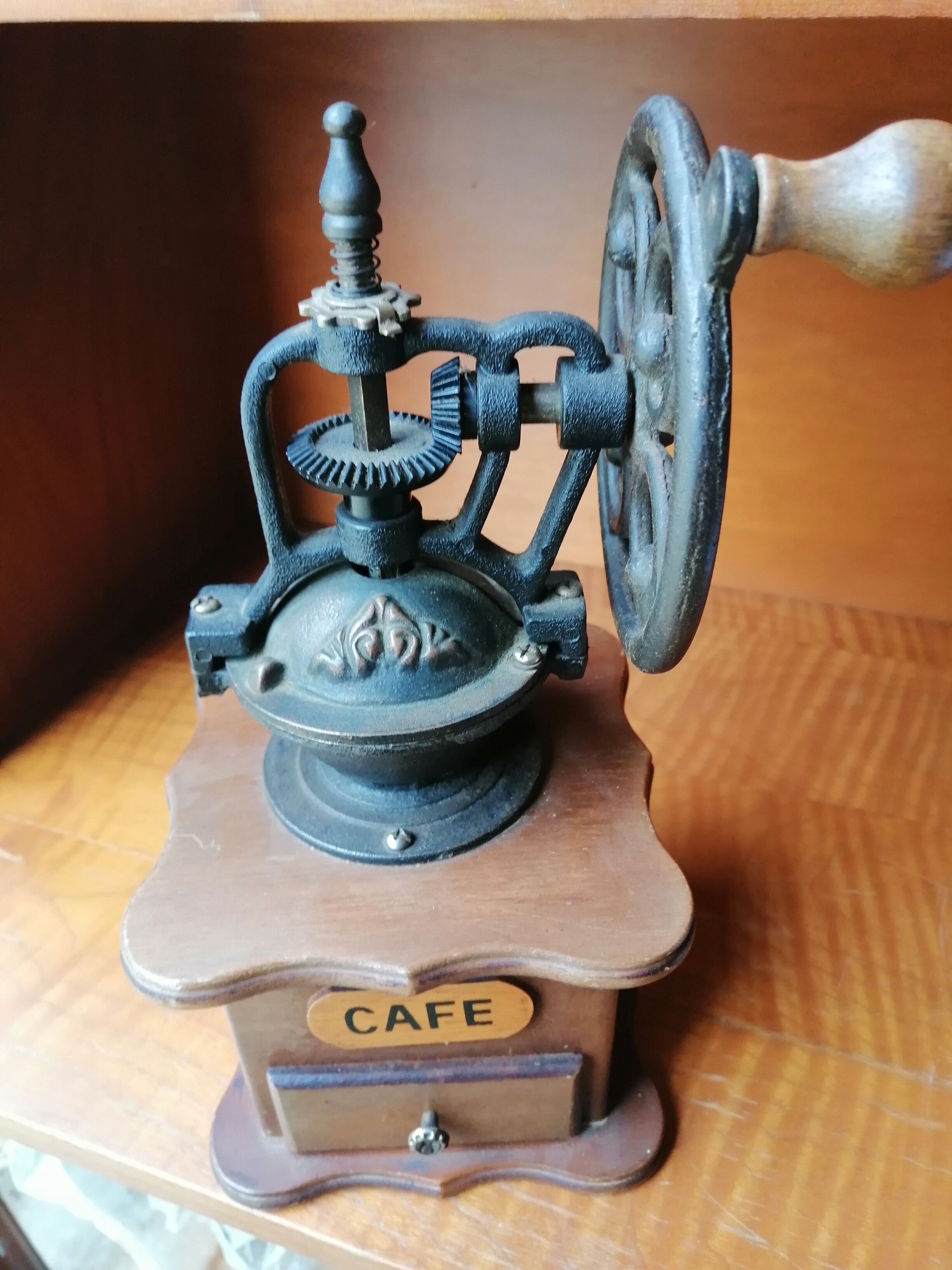 Coffee mill in wood and metal style antique countertop