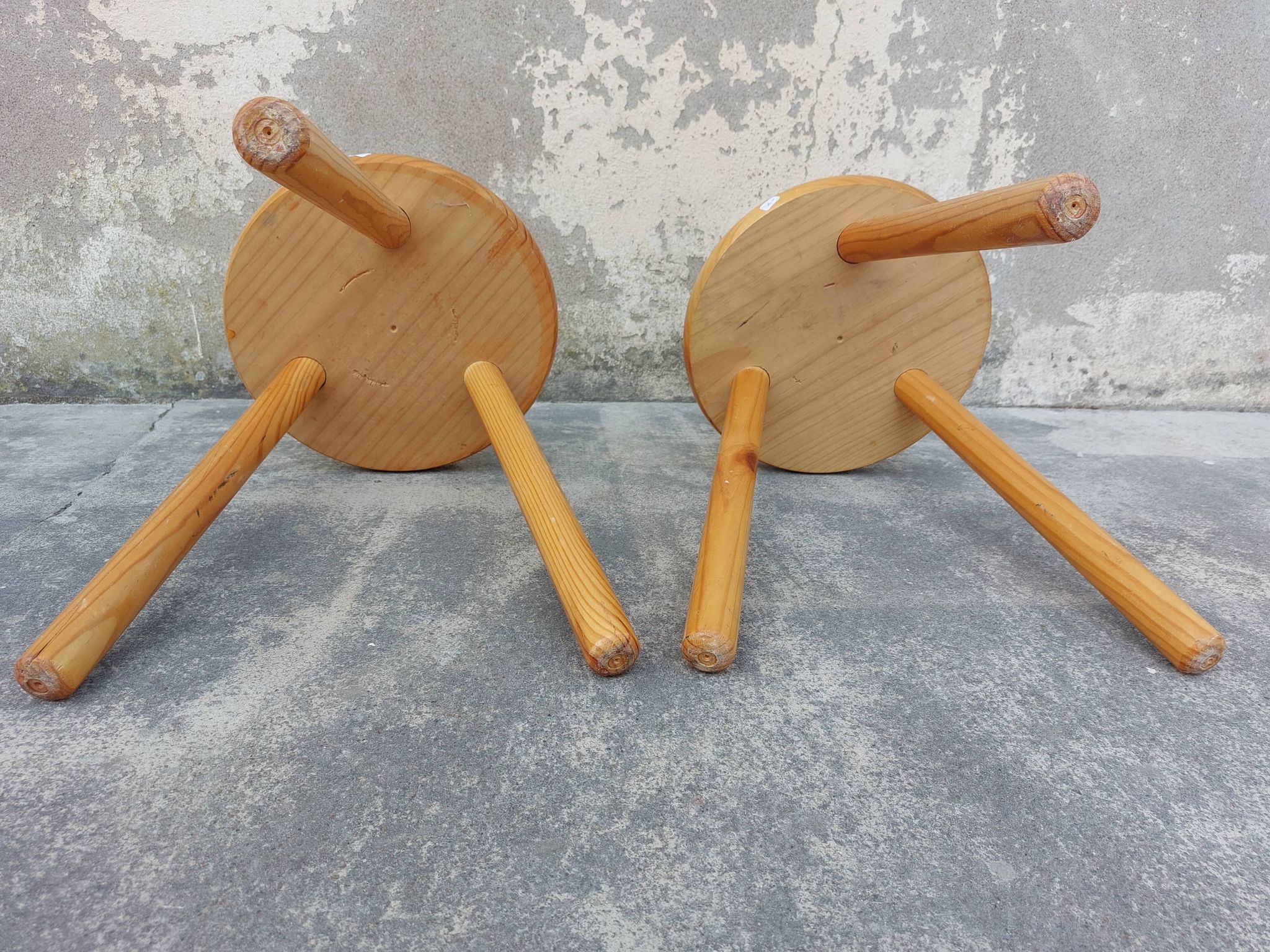 Pair of vintage pine tripod stools