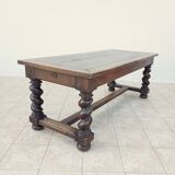 Louis XIII walnut table from the 19th century.