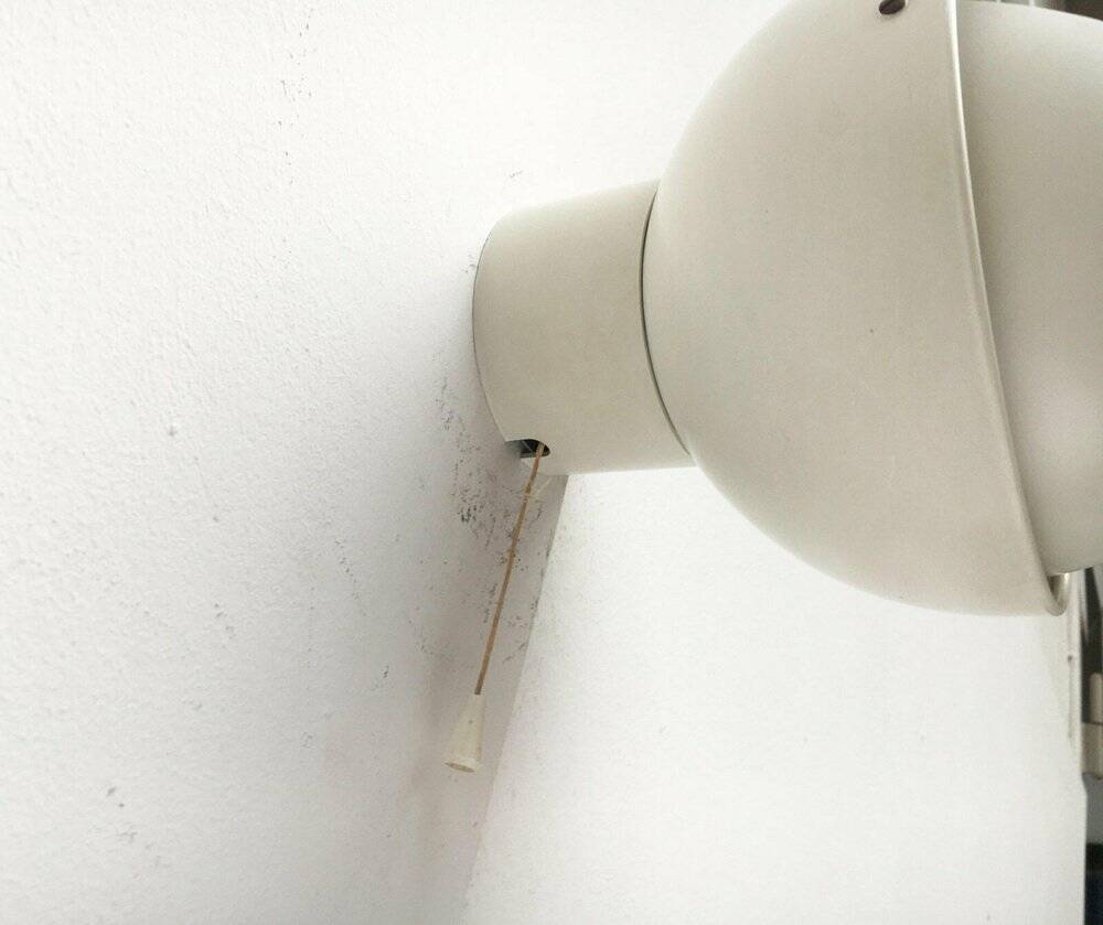 Mid-century Dutch space age wall lamp by Radboud Van Beekum for Raak, 1960s.