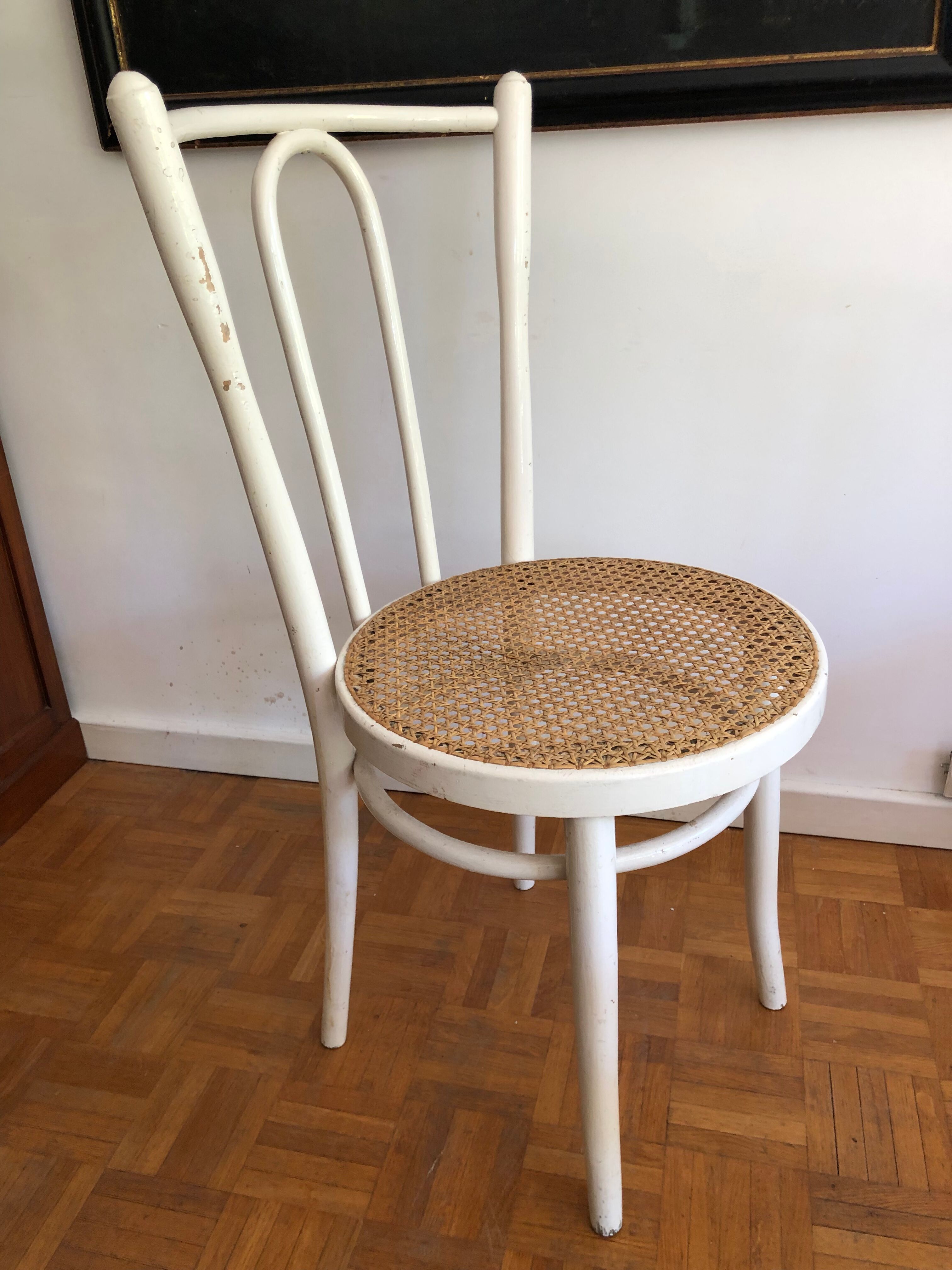 Four vintage bistro chairs