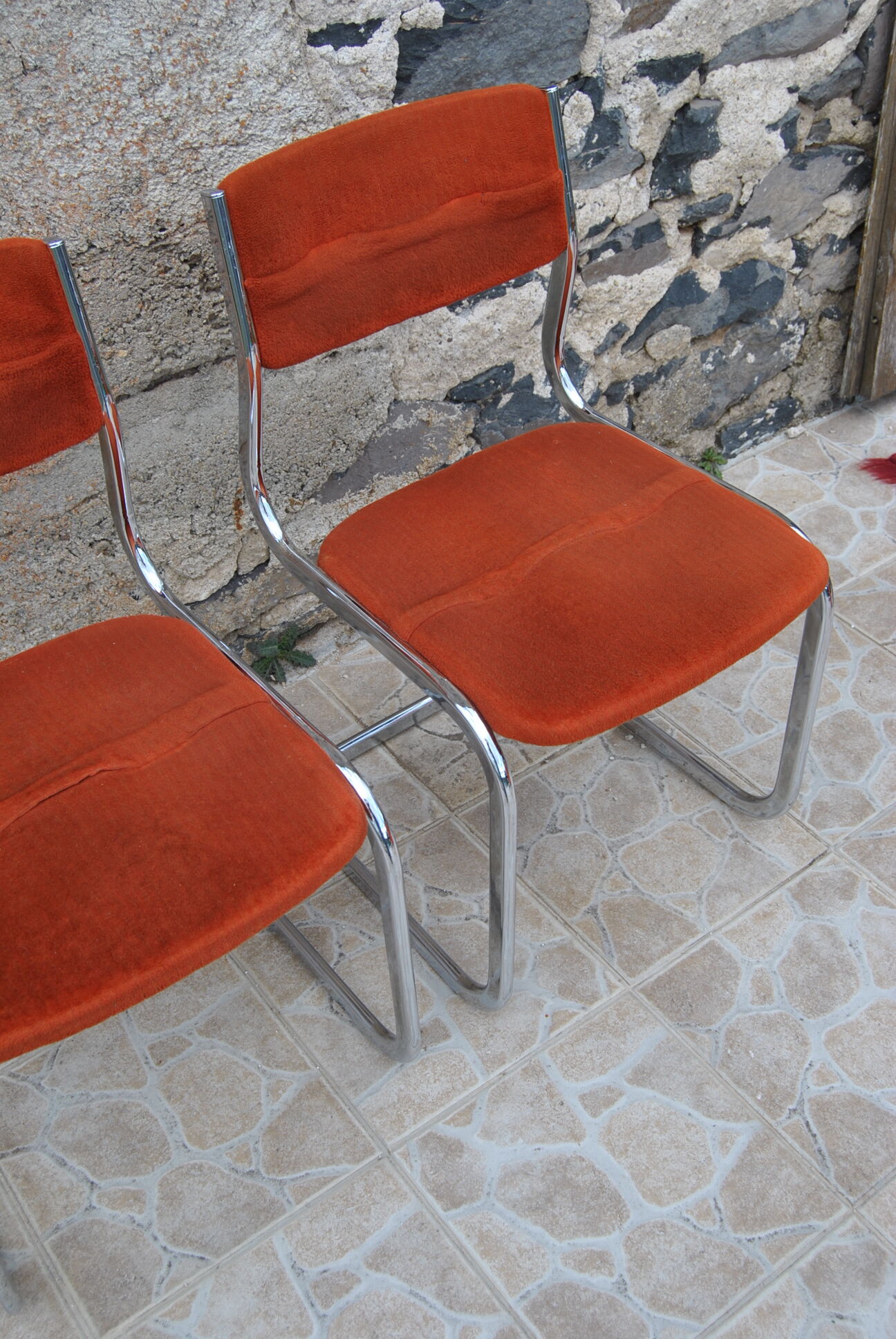 Pair of orange velvet chairs Roche Bobois 70s