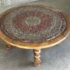 Vintage coffee table in turned wood and leather with astrological decoration.