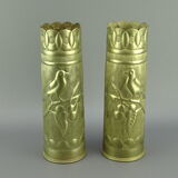 Pair of shell casings forming repulsed copper vases
