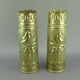 Pair of shell casings forming repulsed copper vases