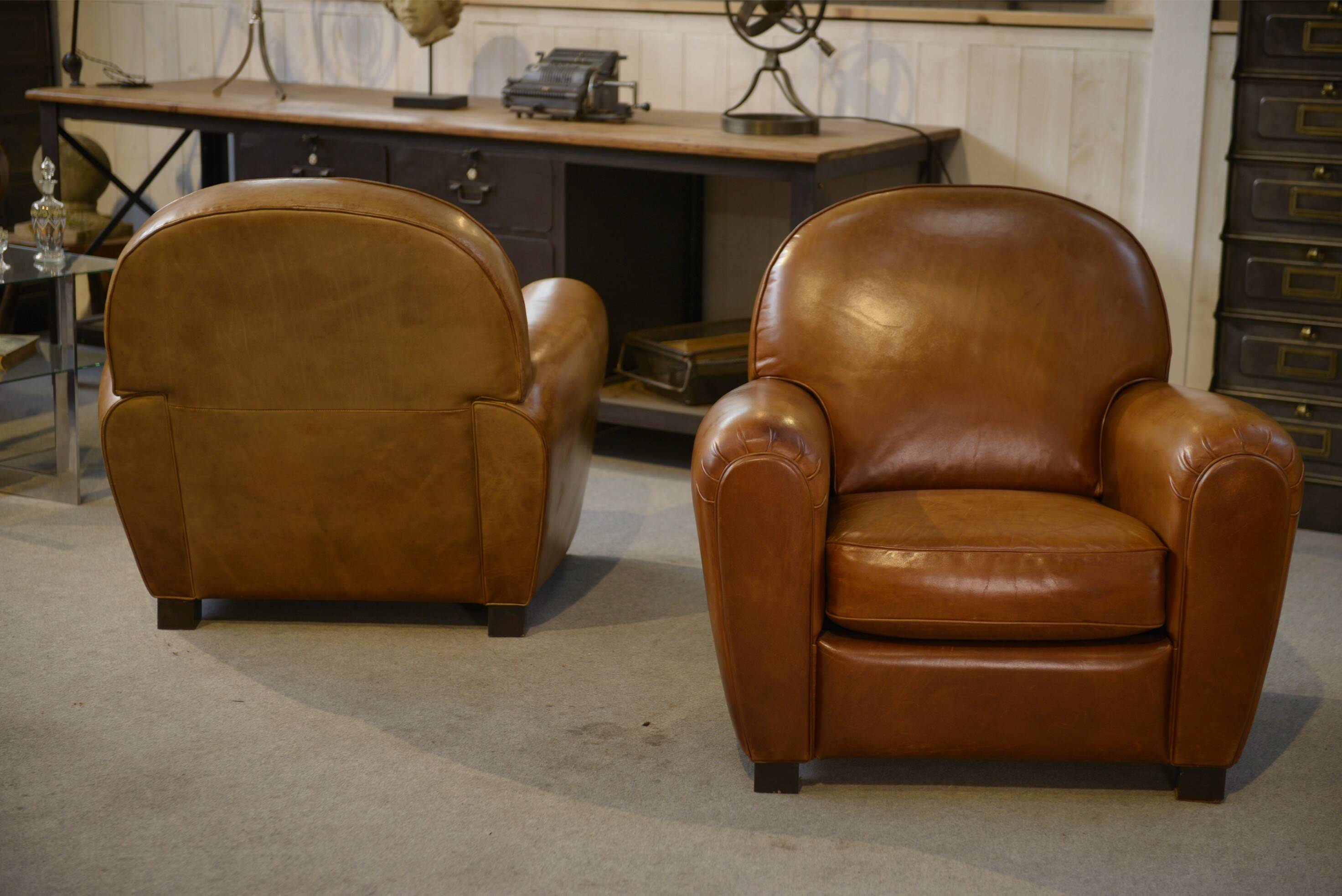 Pair of leather club armchairs