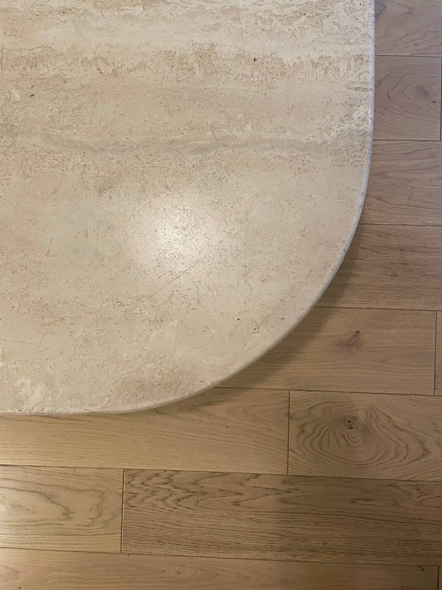 Roche Bobois “eye” travertine table