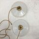 Pair of white opaline suspensions with serrated edges