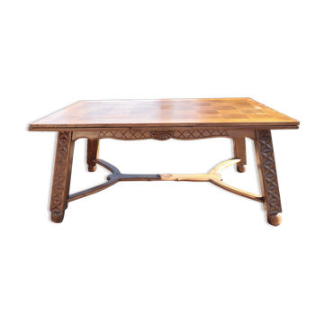 Table vintage en bois massif sculpté