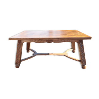 Table vintage en bois massif sculpté