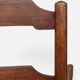 Antique rustic armchair in walnut and leather, 18th century.