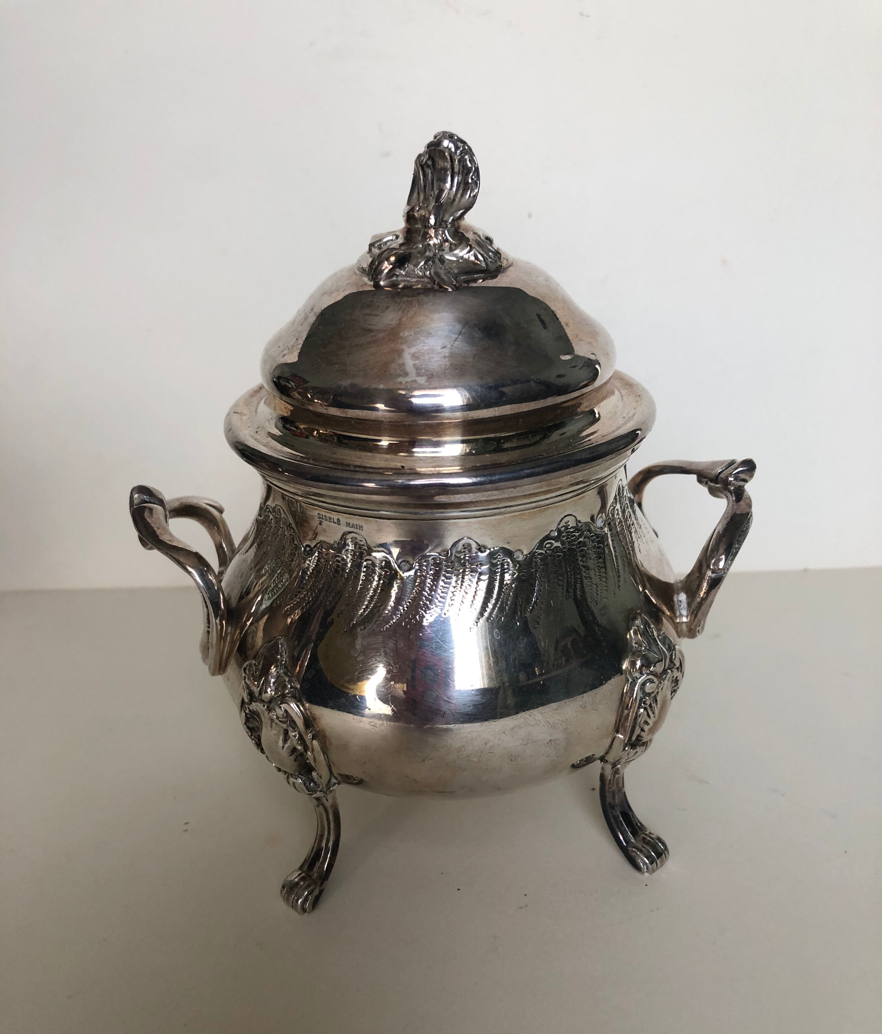 Tea service and silver metal coffee