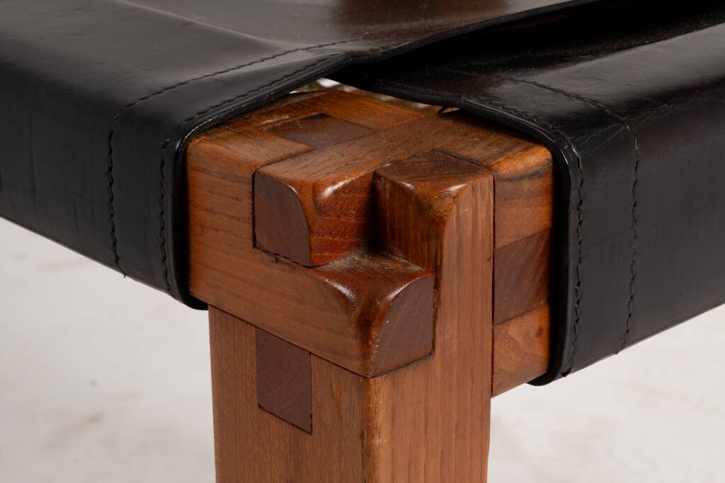 Pierre Chapo. Series of 8 "S11" chairs in elm and leather. 1960s-70s.