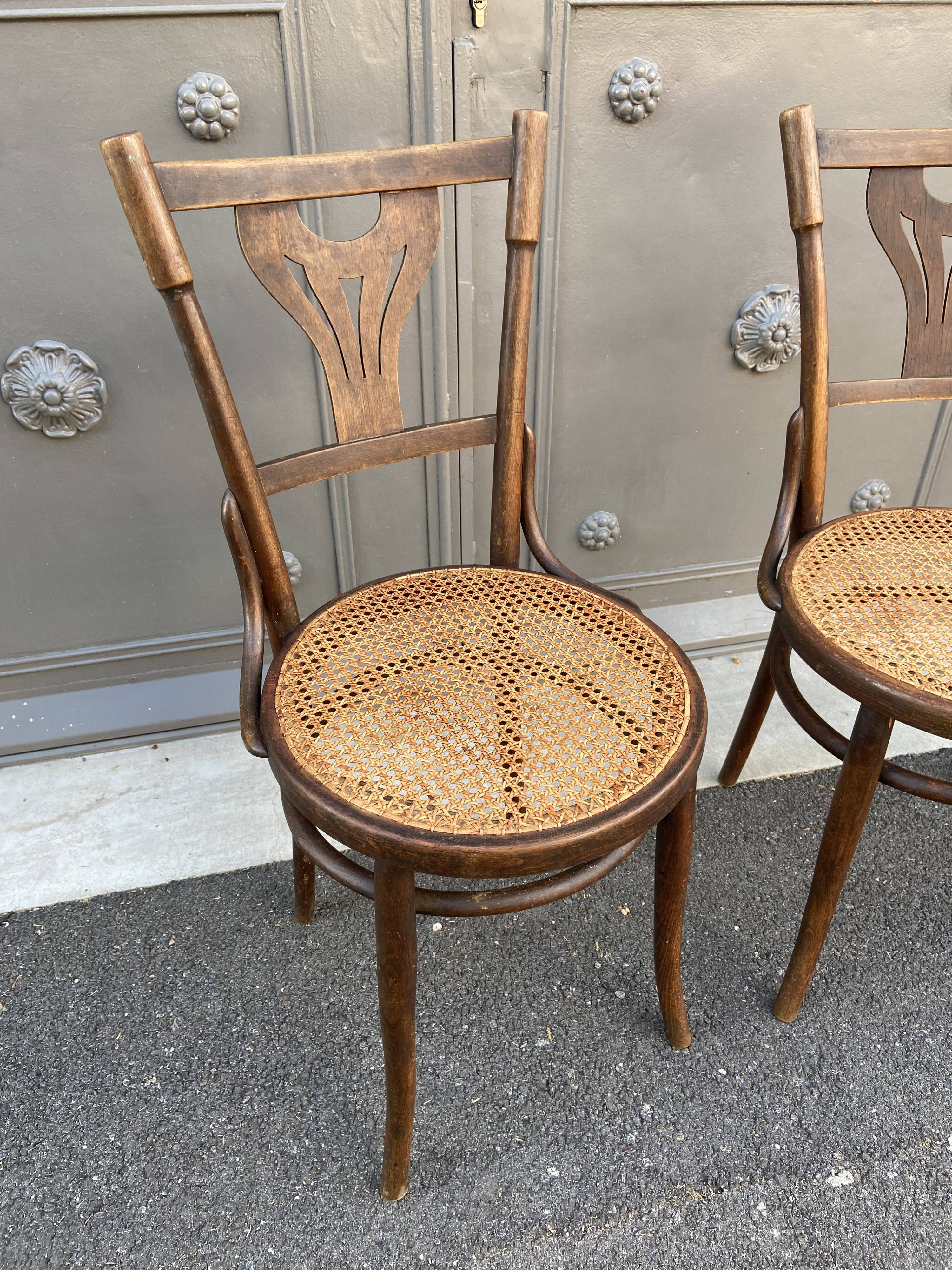 Pair of curved wooden bistro chairs