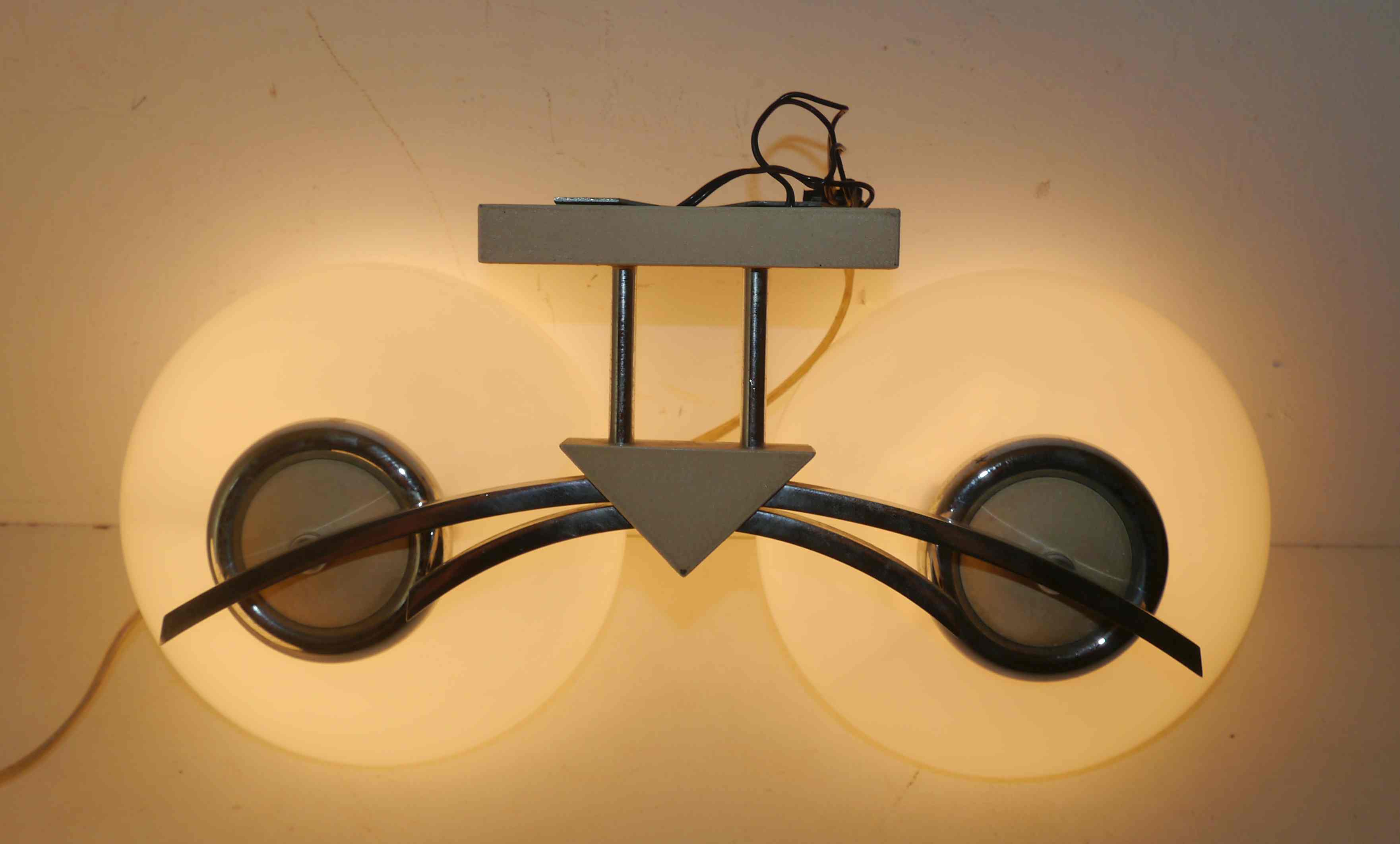 Pair of 60s wall lights in metal and opaline