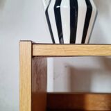 Bedside table - small wooden piece of furniture with a tubular metal base.