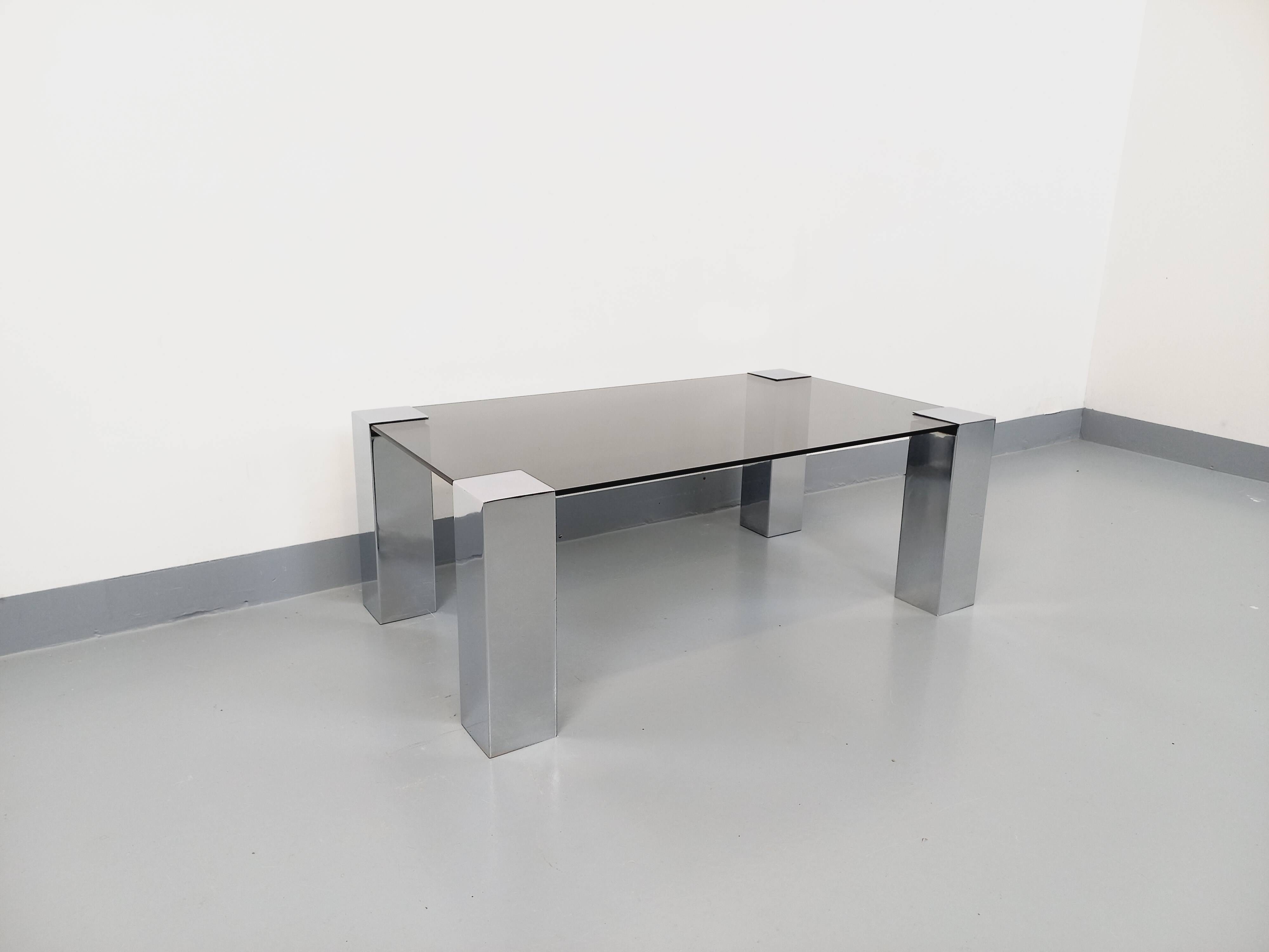 Vintage Italian coffee table Cidue in smoked glass and chrome metal from the 70s