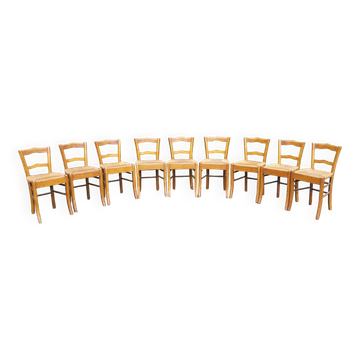 Suite of 9 straw chairs