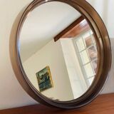 Vintage round smoked plastic mirror, circa 1970s.