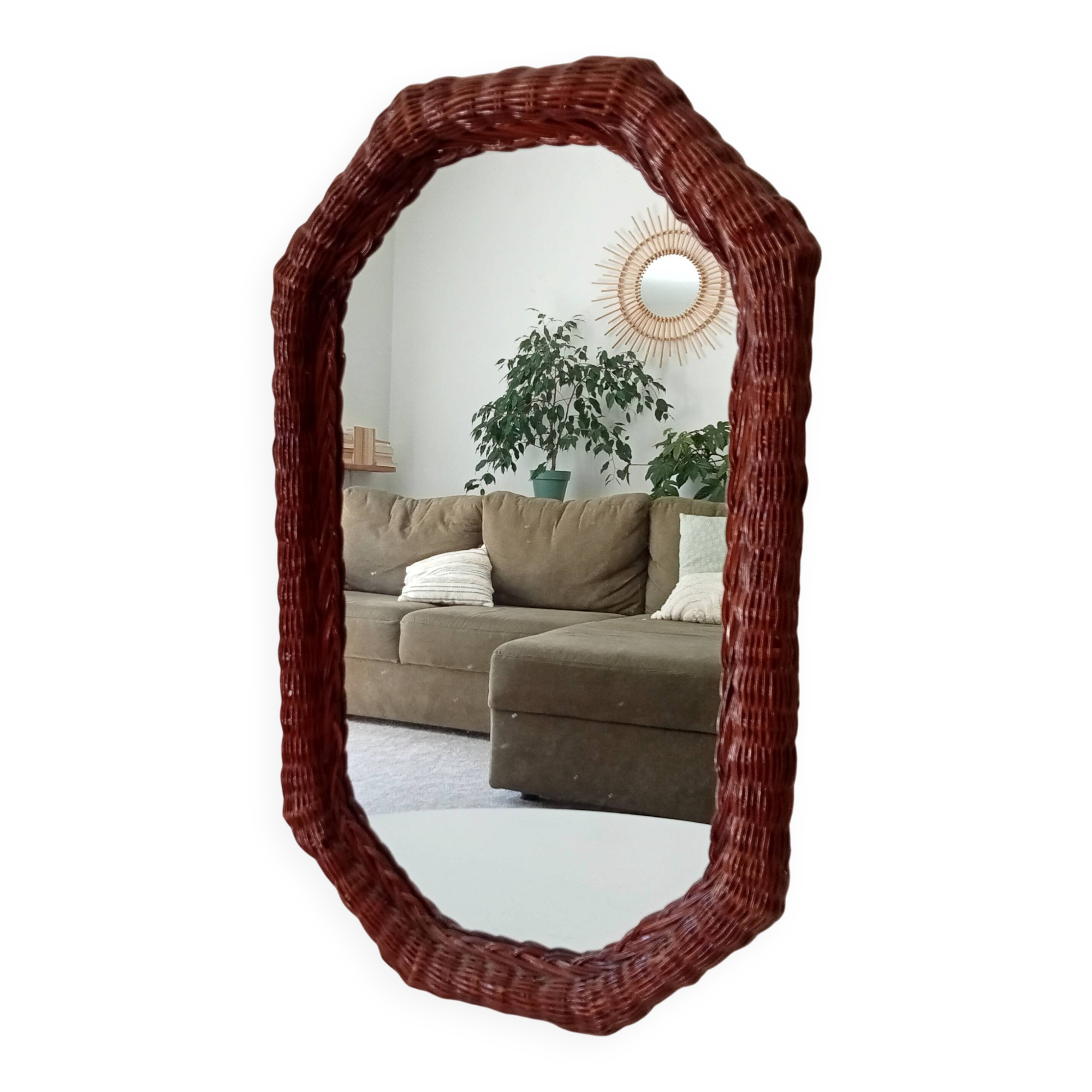Vintage octagonal mirror in woven rattan.
