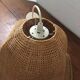 Hanging lamp in wicker