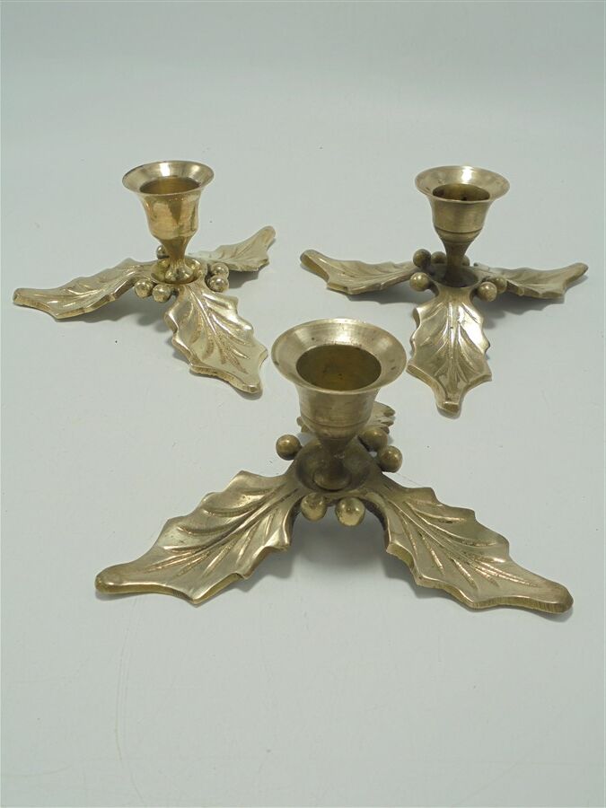 Trio of brass candle holders décor holly