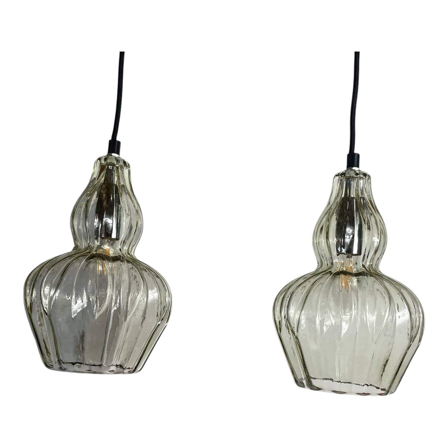 Pair of vintage glass pendant lights.