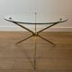 Round tripod designer coffee table in brass